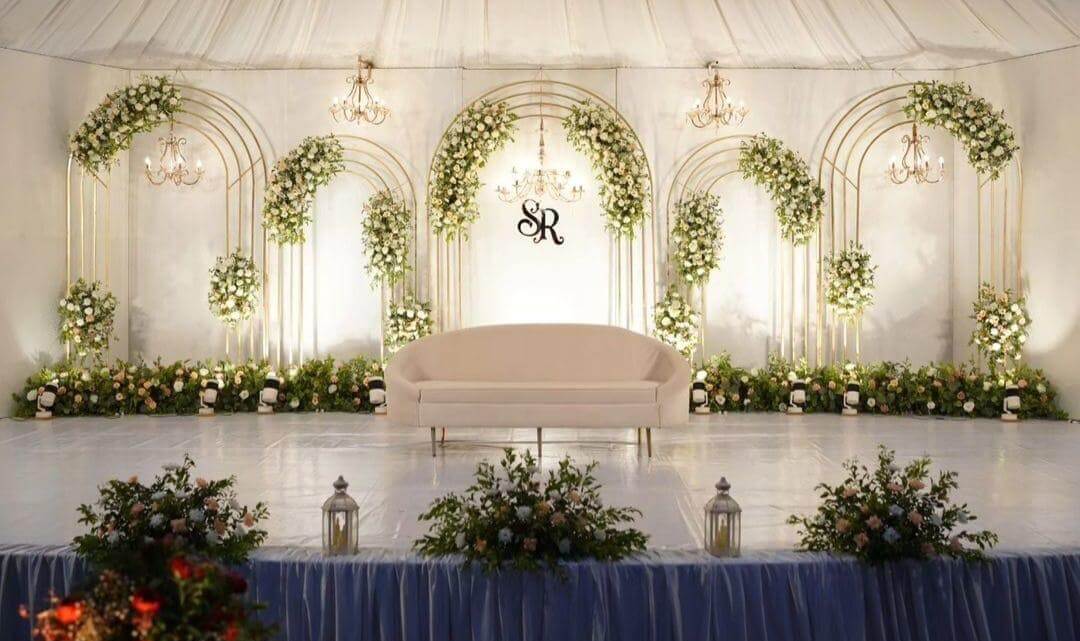 Elegant Wedding Stage with Floral Arches